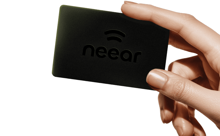 Hand holding Neear card